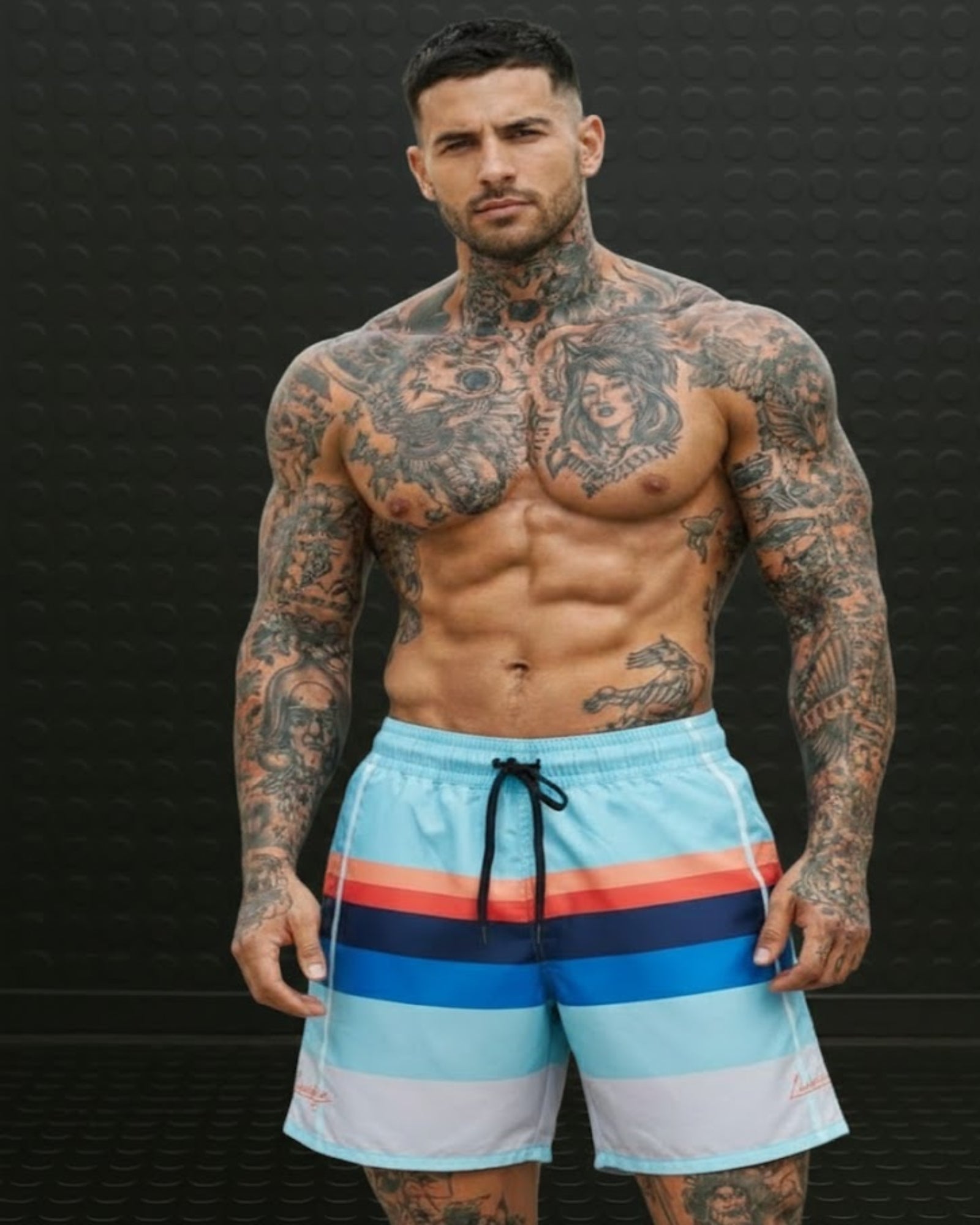 Nueva Colección: Pantaloneta Premium Celeste Firma Naranja